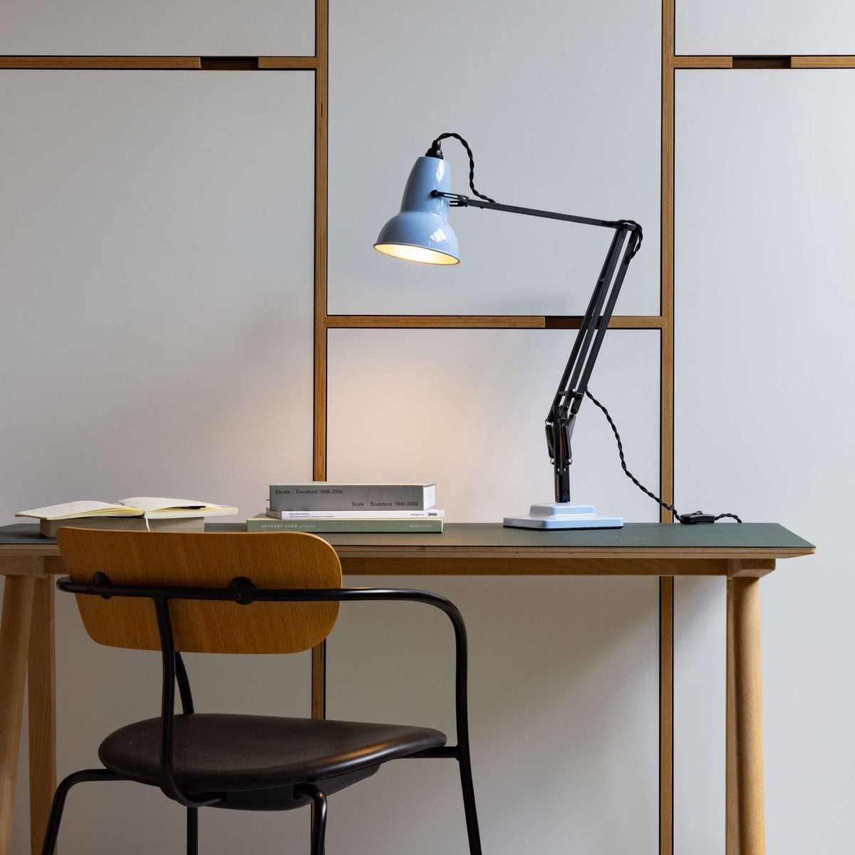 Anglepoise Original 1227 Desk Lamp in Opal Blue and Satin Black, styled in an interior setting, painted steel