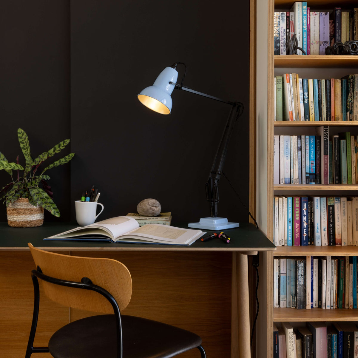 Anglepoise Original 1227 Desk Lamp in Opal Blue and Satin Black, styled in an interior setting, painted steel