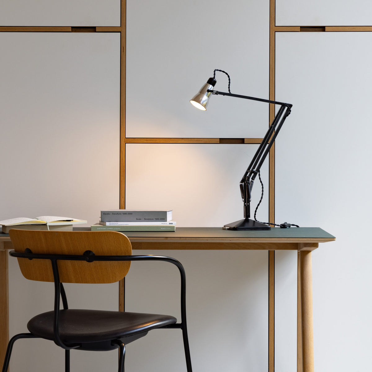 Anglepoise Original 315 Desk Lamp in Aluminum and Black, styled in an interior setting, polished aluminum