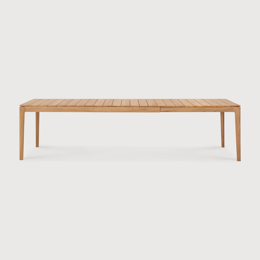 Ethnicraft Bok Outdoor Extendable Dining Table in teak styled in a dining room
