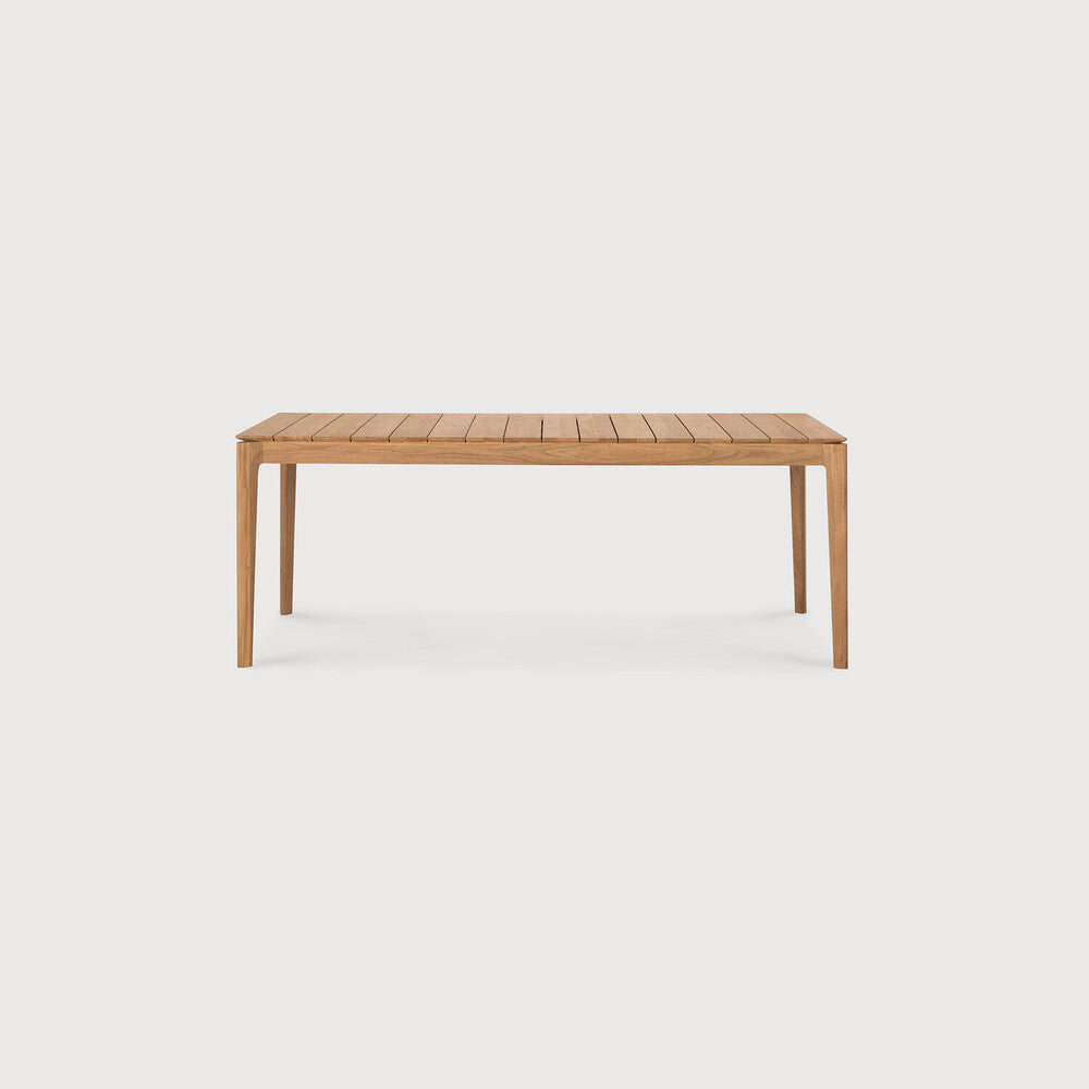 Ethnicraft Bok Outdoor Extendable Dining Table in teak styled in a dining room