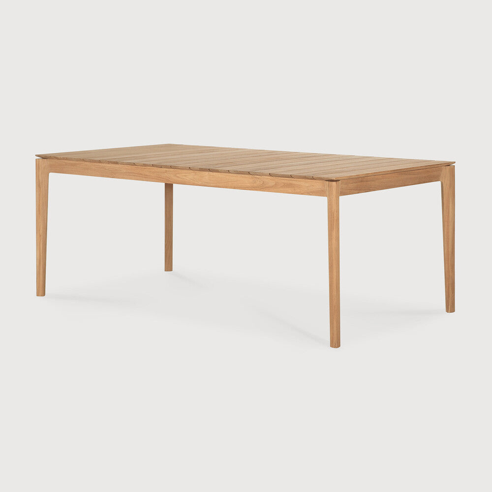 Ethnicraft Bok Outdoor Extendable Dining Table in teak styled in a dining room
