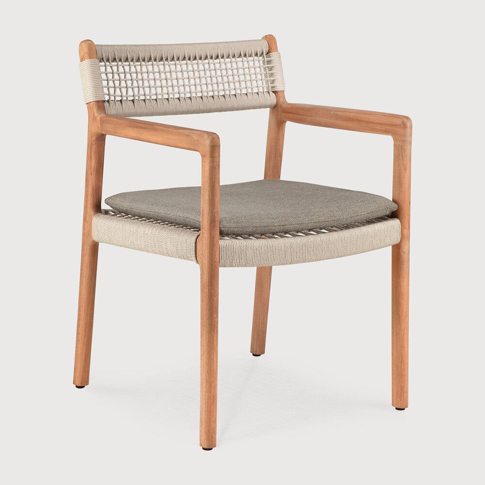 Ethnicraft Jack Woven Outdoor Dining Chair in teak styled in a dining room