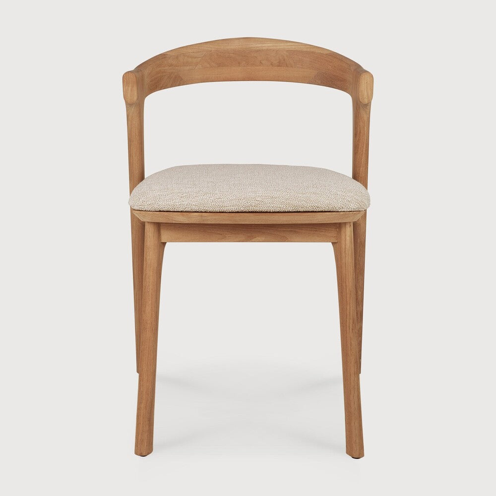 Ethnicraft Bok Outdoor Dining Chair in teak styled in a dining room
