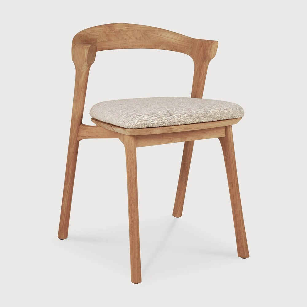 Ethnicraft Bok Outdoor Dining Chair in teak styled in a dining room