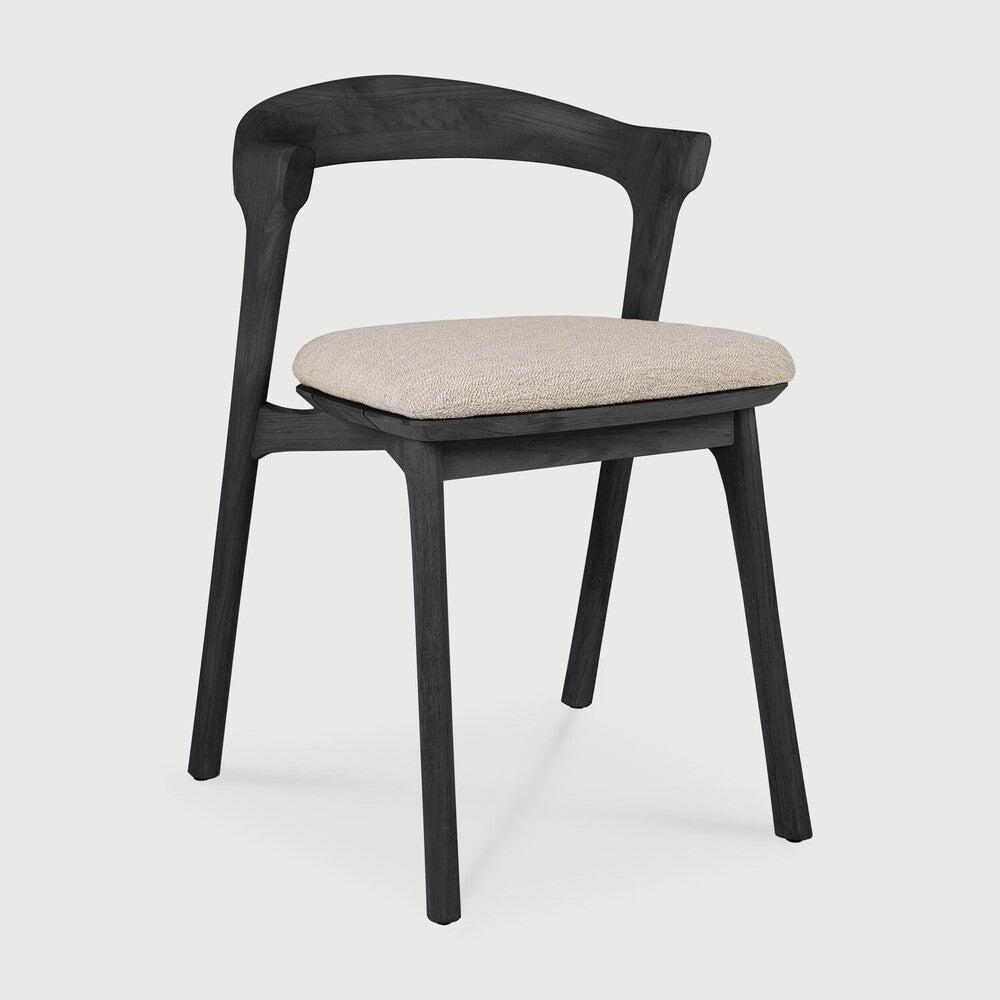 Ethnicraft Bok Outdoor Dining Chair in teak styled in a dining room