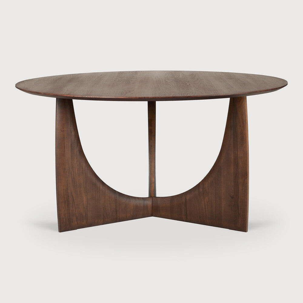 Ethnicraft Geometric Round Dining Table in teak styled in a dining room