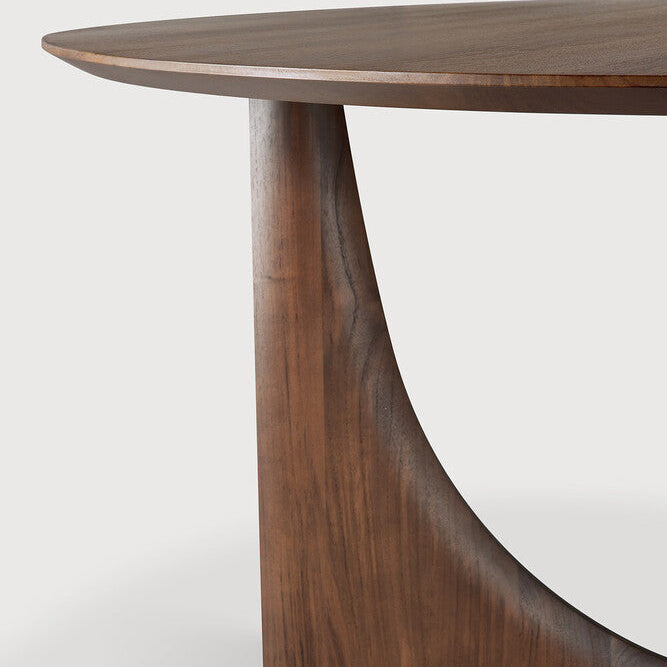Ethnicraft Geometric Round Dining Table in teak styled in a dining room