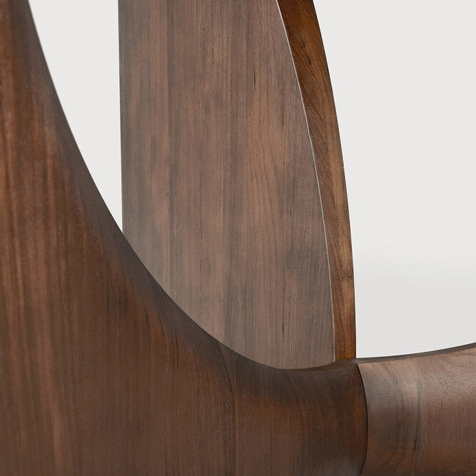 Ethnicraft Geometric Round Dining Table in teak styled in a dining room
