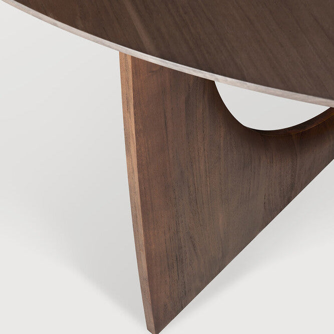 Ethnicraft Geometric Round Dining Table in teak styled in a dining room
