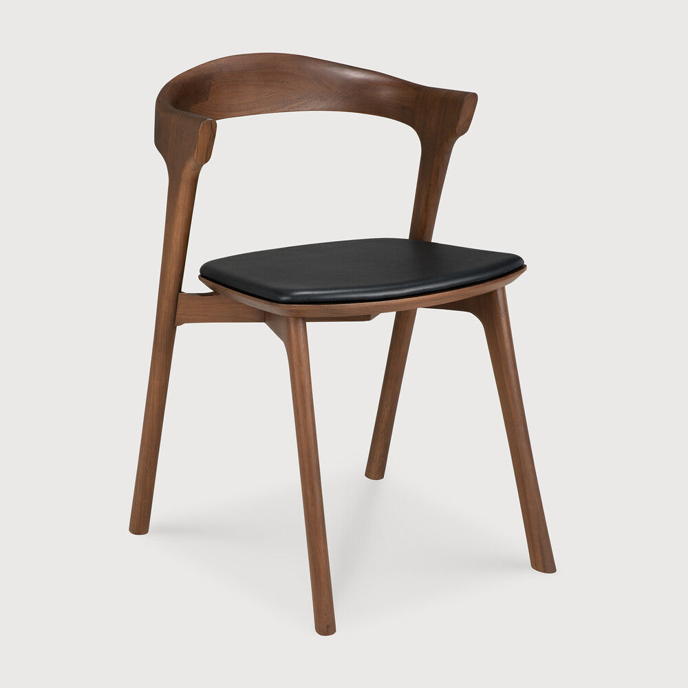 Ethnicraft Bok Dining Chair in teak styled in a dining room