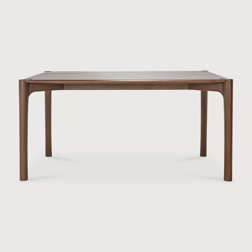 Ethnicraft PI Dining Table in teak styled in a dining room