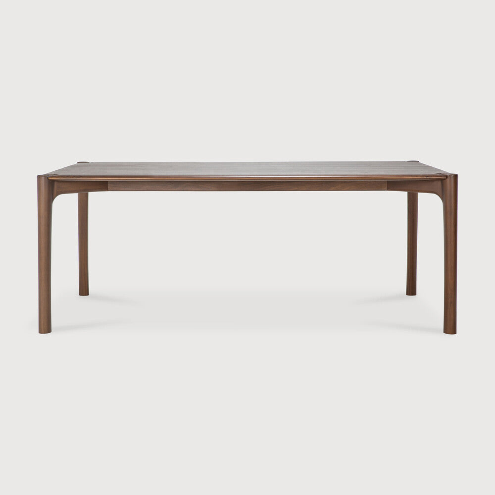 Ethnicraft PI Dining Table in teak styled in a dining room