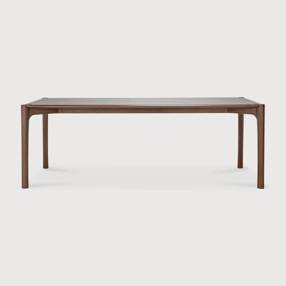 Ethnicraft PI Dining Table in teak styled in a dining room