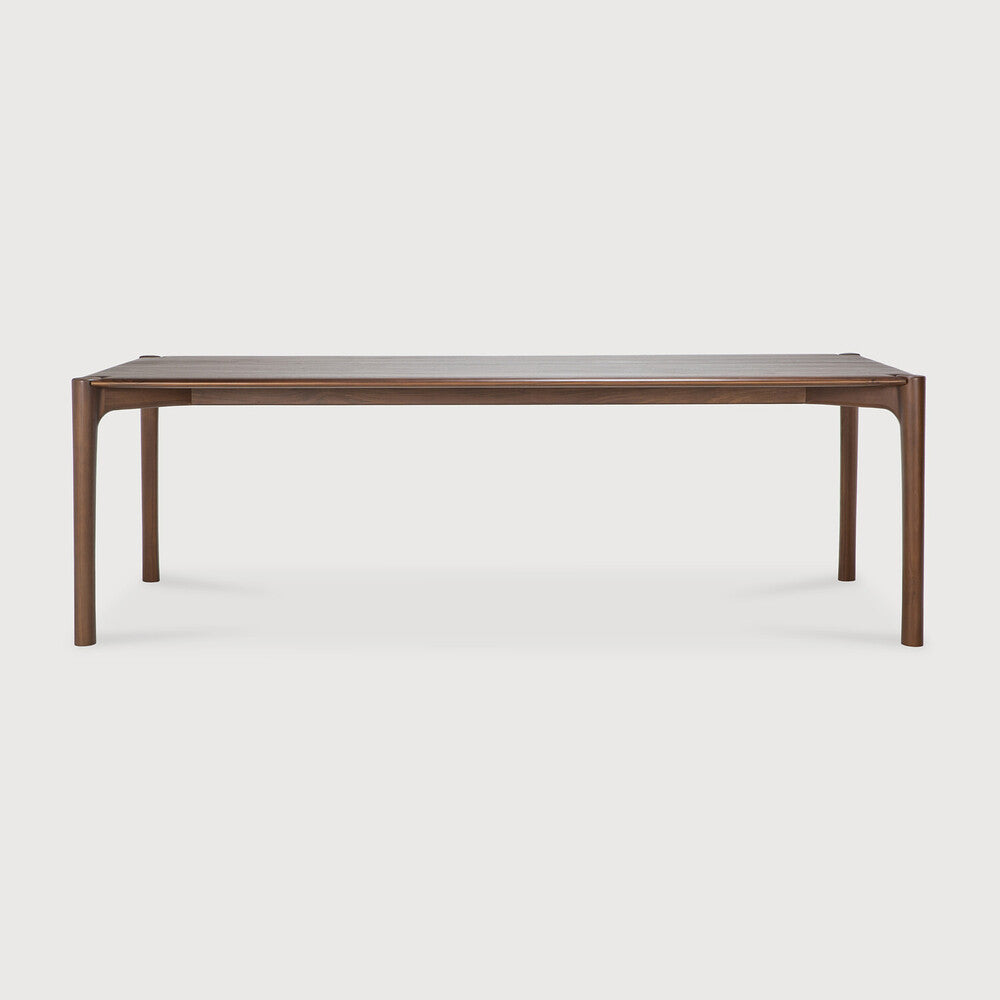 Ethnicraft PI Dining Table in teak styled in a dining room