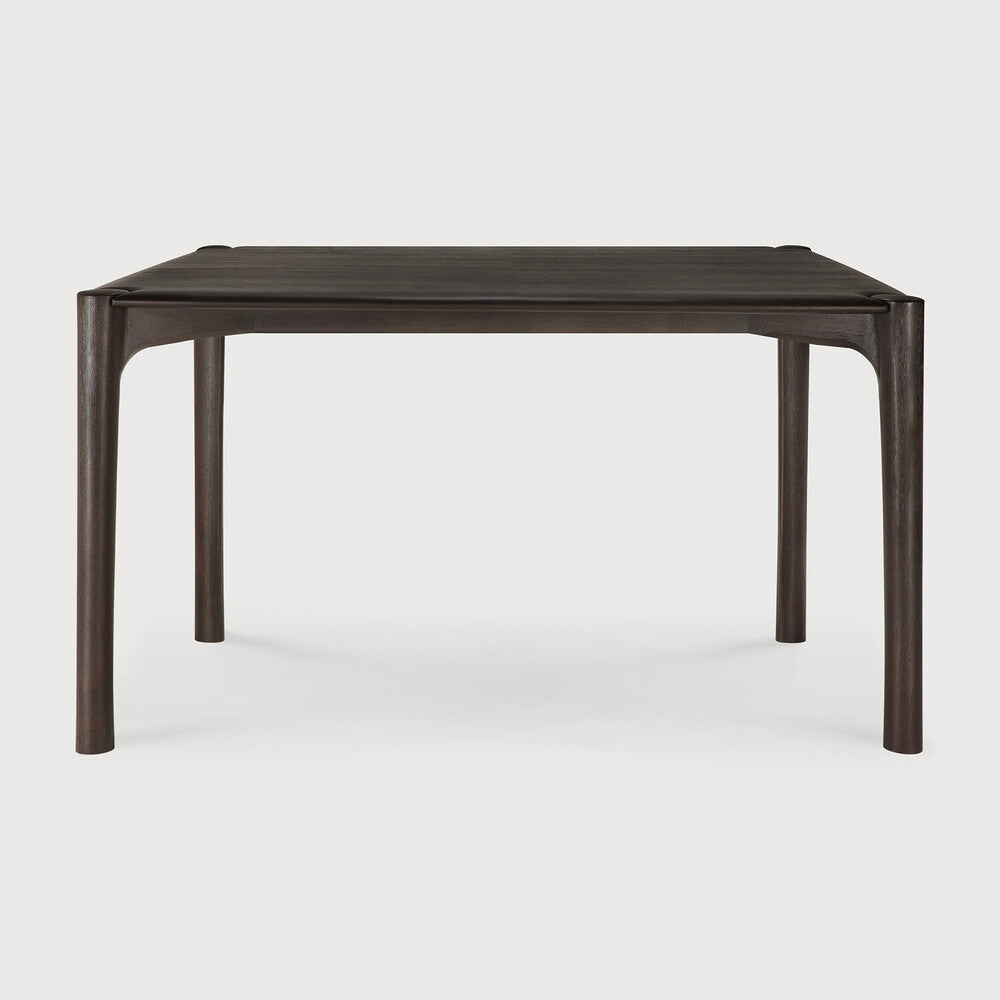 Ethnicraft PI Dining Table in teak styled in a dining room