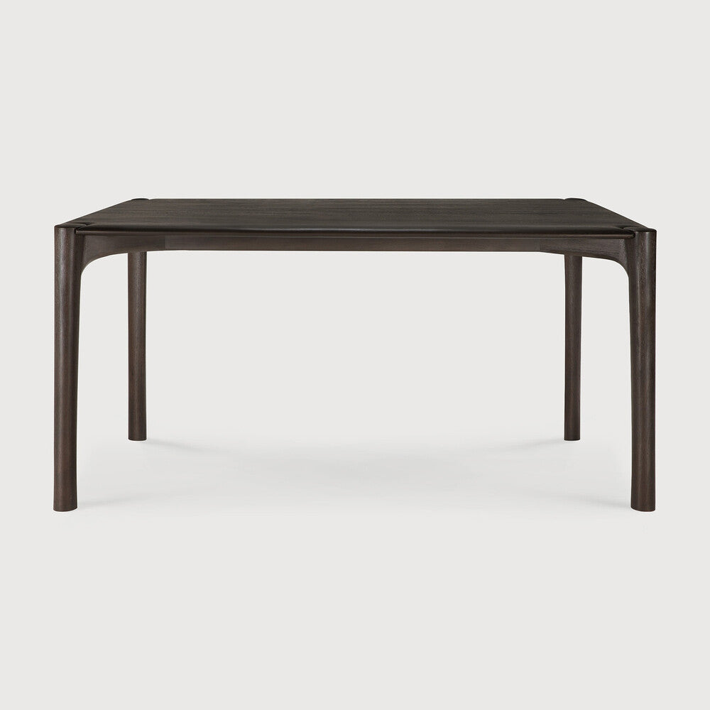 Ethnicraft PI Dining Table in teak styled in a dining room