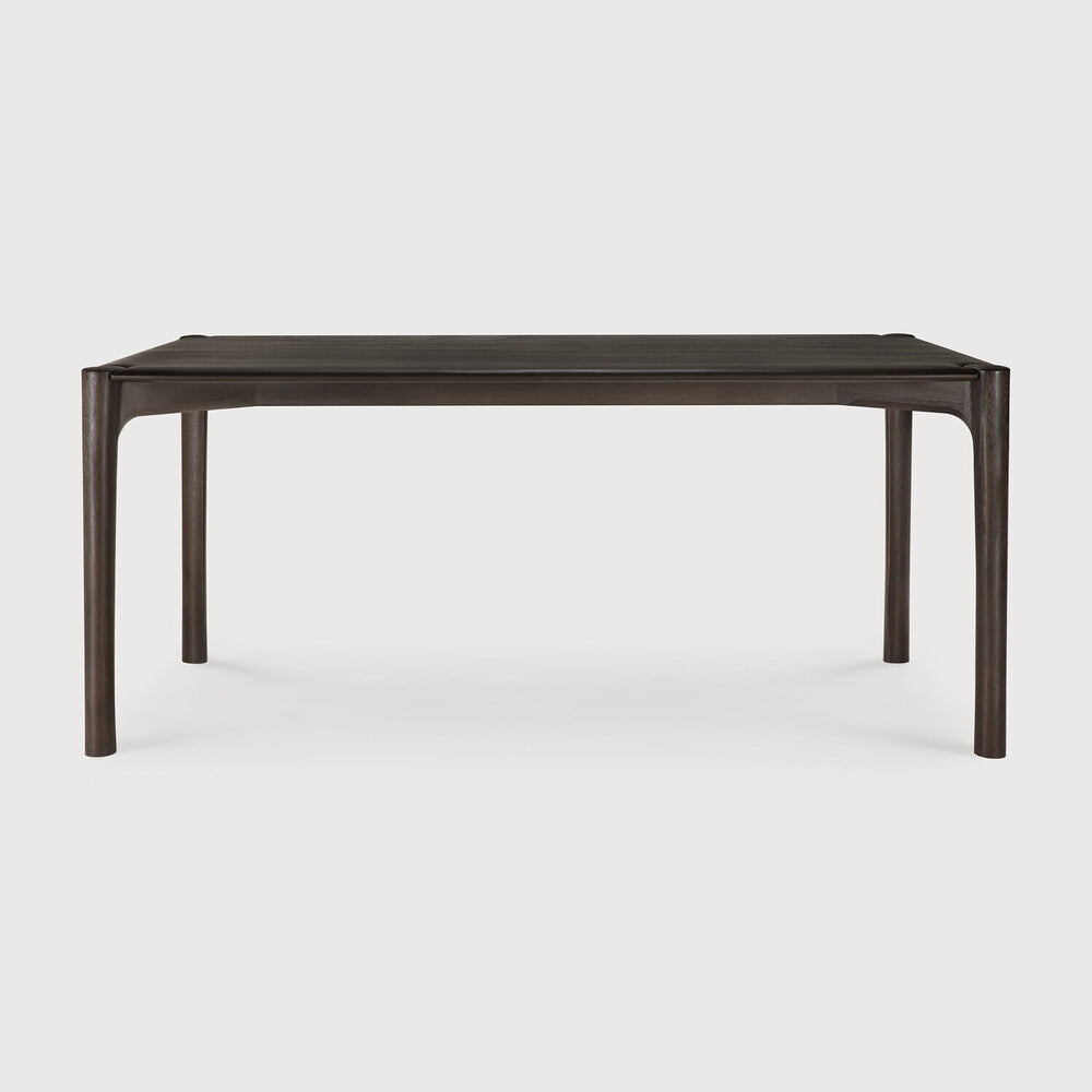 Ethnicraft PI Dining Table in teak styled in a dining room
