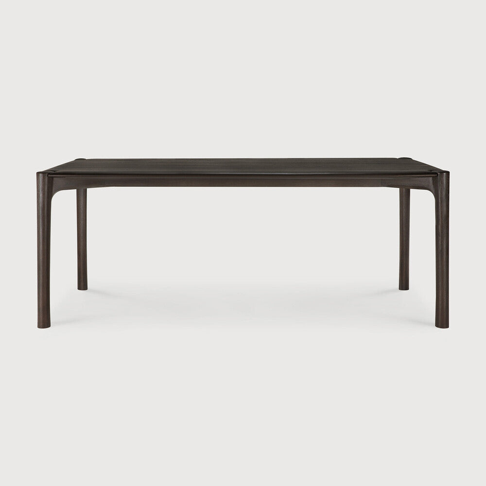 Ethnicraft PI Dining Table in teak styled in a dining room