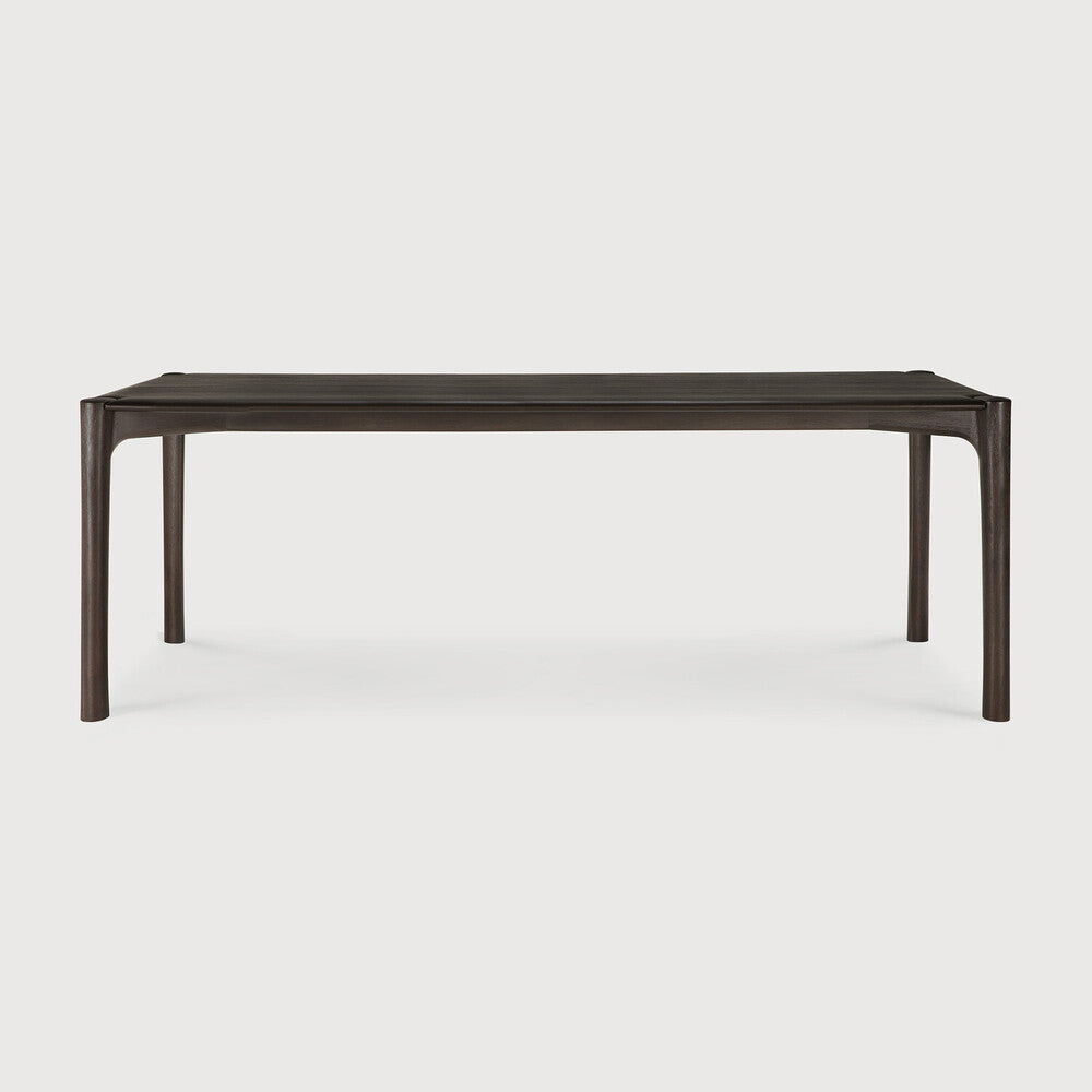 Ethnicraft PI Dining Table in teak styled in a dining room