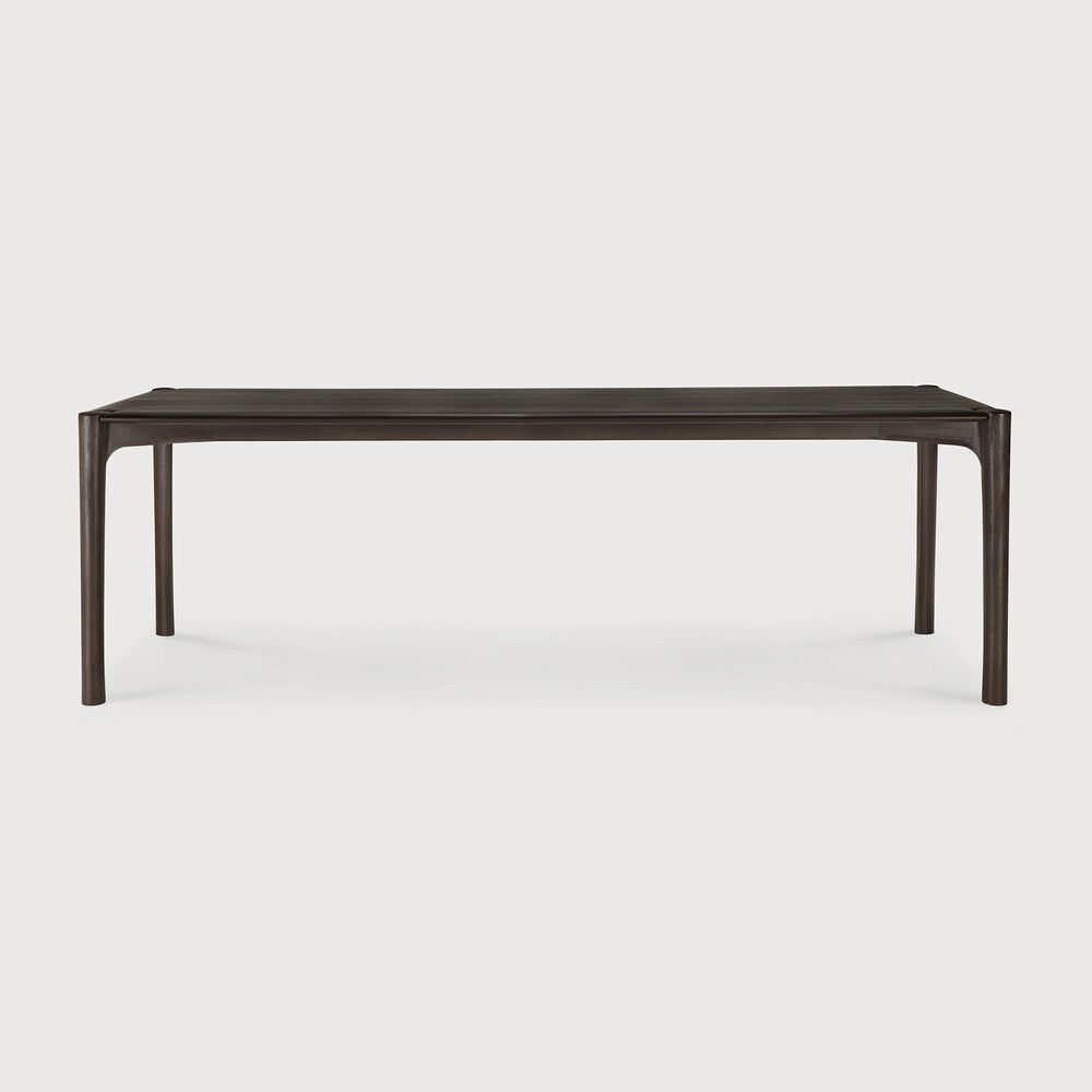 Ethnicraft PI Dining Table in teak styled in a dining room
