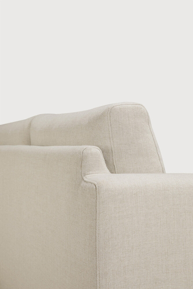 Detail of Ethnicraft Ease Sofa showing the seat and back cushion junction