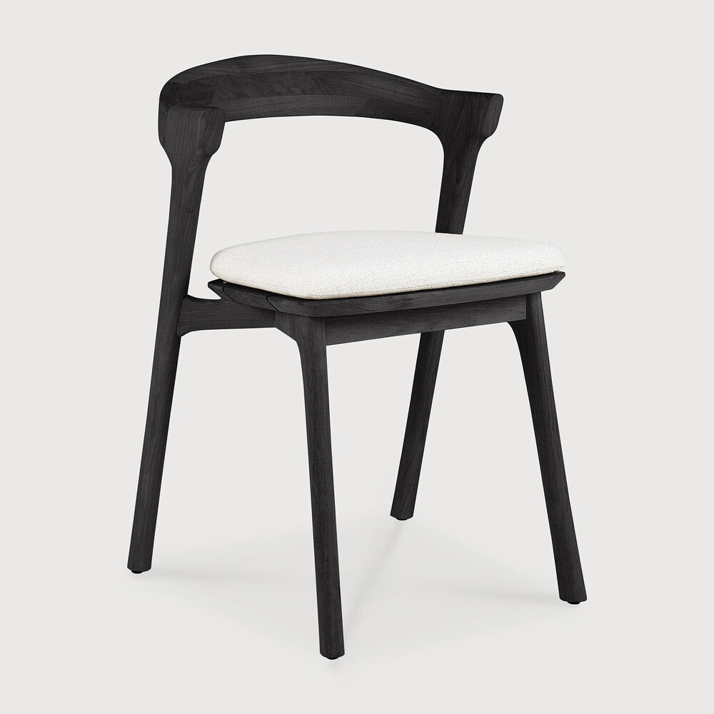 Ethnicraft Bok Outdoor Dining Chair in teak styled in a dining room