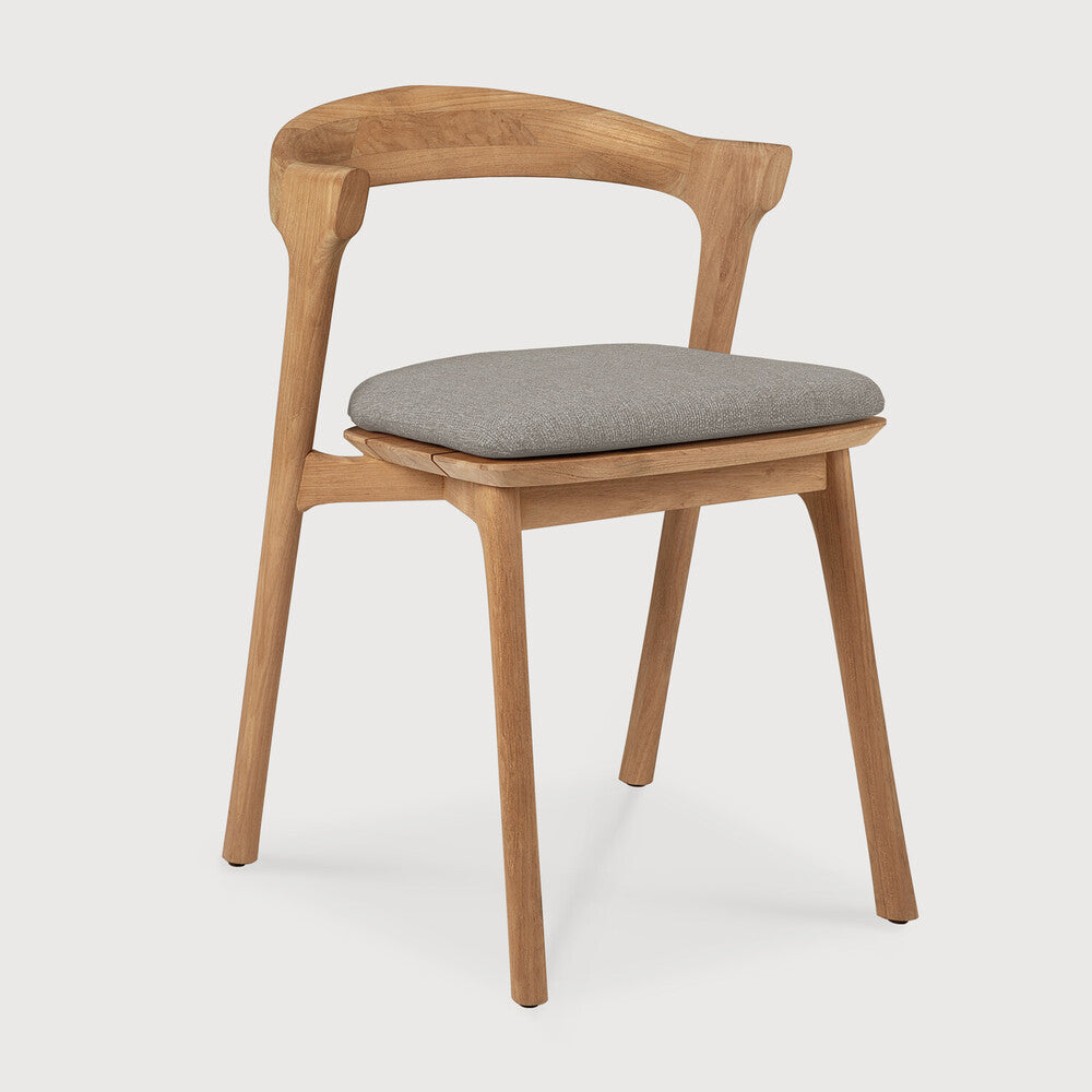 Ethnicraft Bok Outdoor Dining Chair in teak styled in a dining room