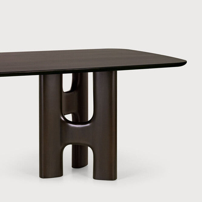 Ethnicraft Flow Dining Table in mahogany styled in a dining room