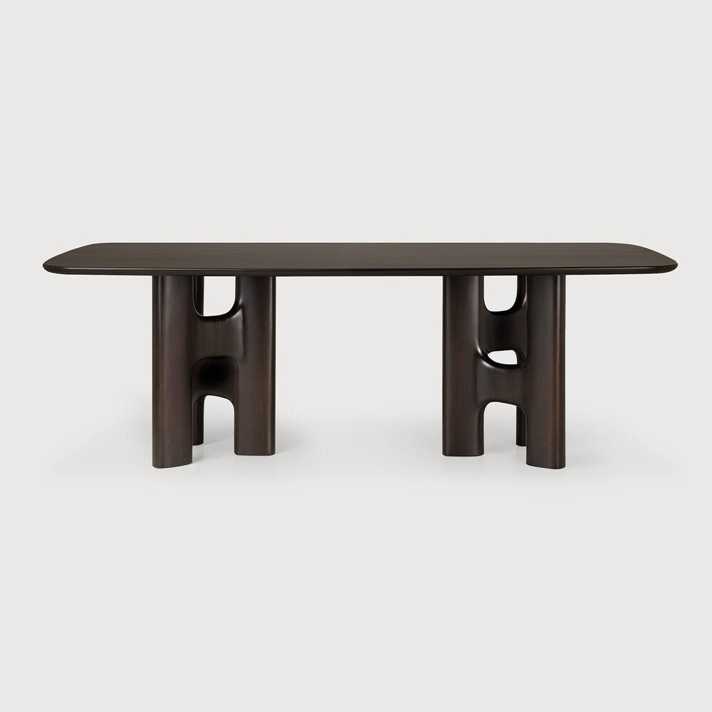 Ethnicraft Flow Dining Table in mahogany styled in a dining room