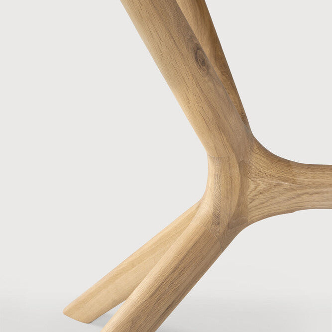 Ethnicraft X Dining Table in oak styled in a dining room
