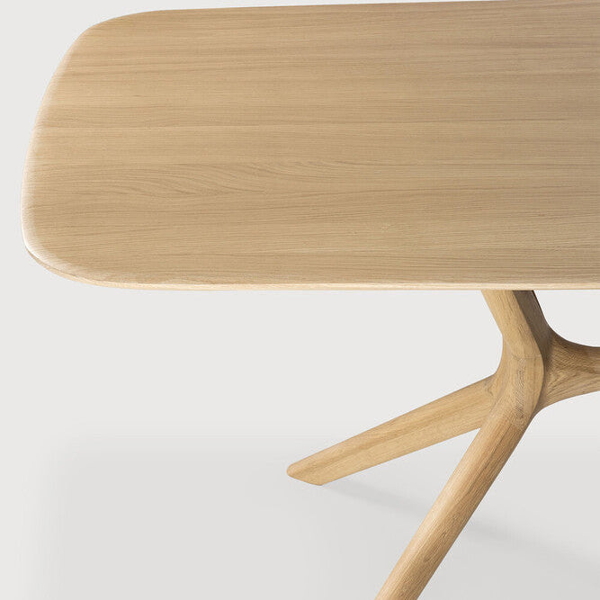 Ethnicraft X Dining Table in oak styled in a dining room
