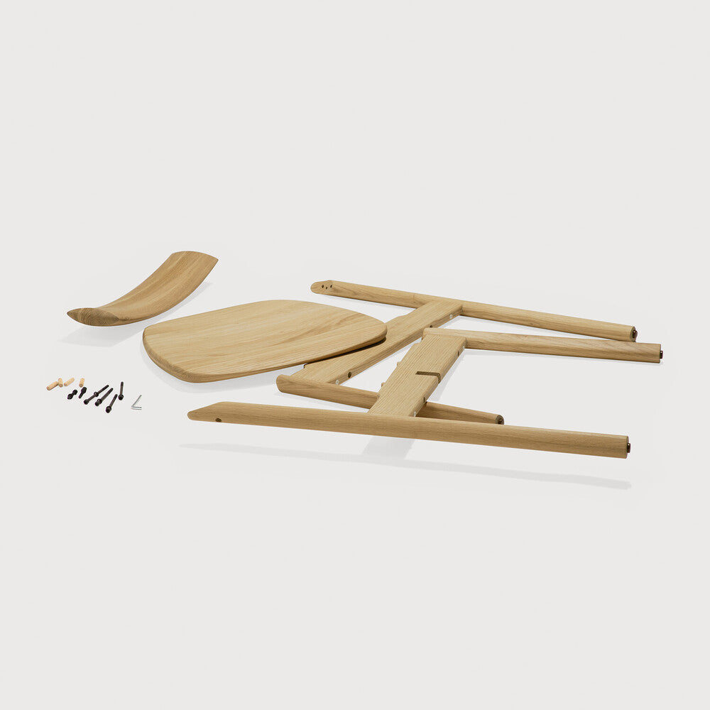 Ethnicraft Risu Dining Chair in oak styled in a dining room