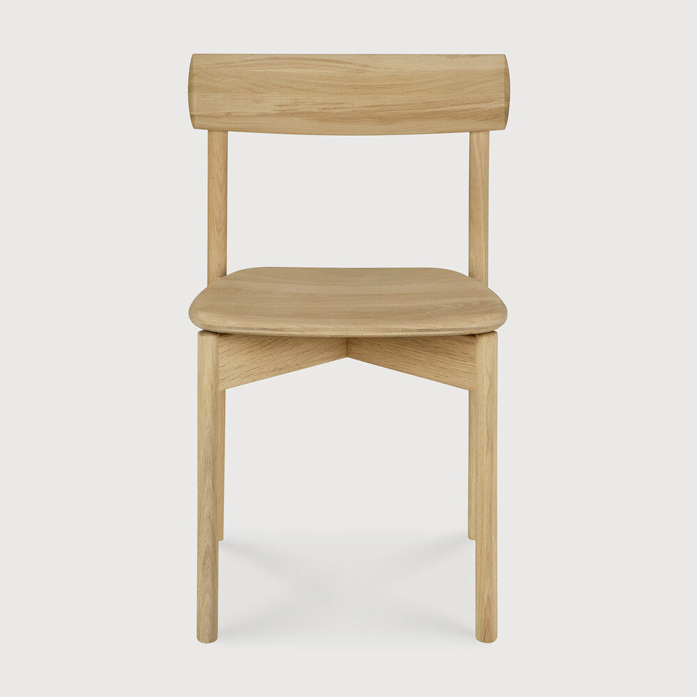 Ethnicraft Risu Dining Chair in oak styled in a dining room