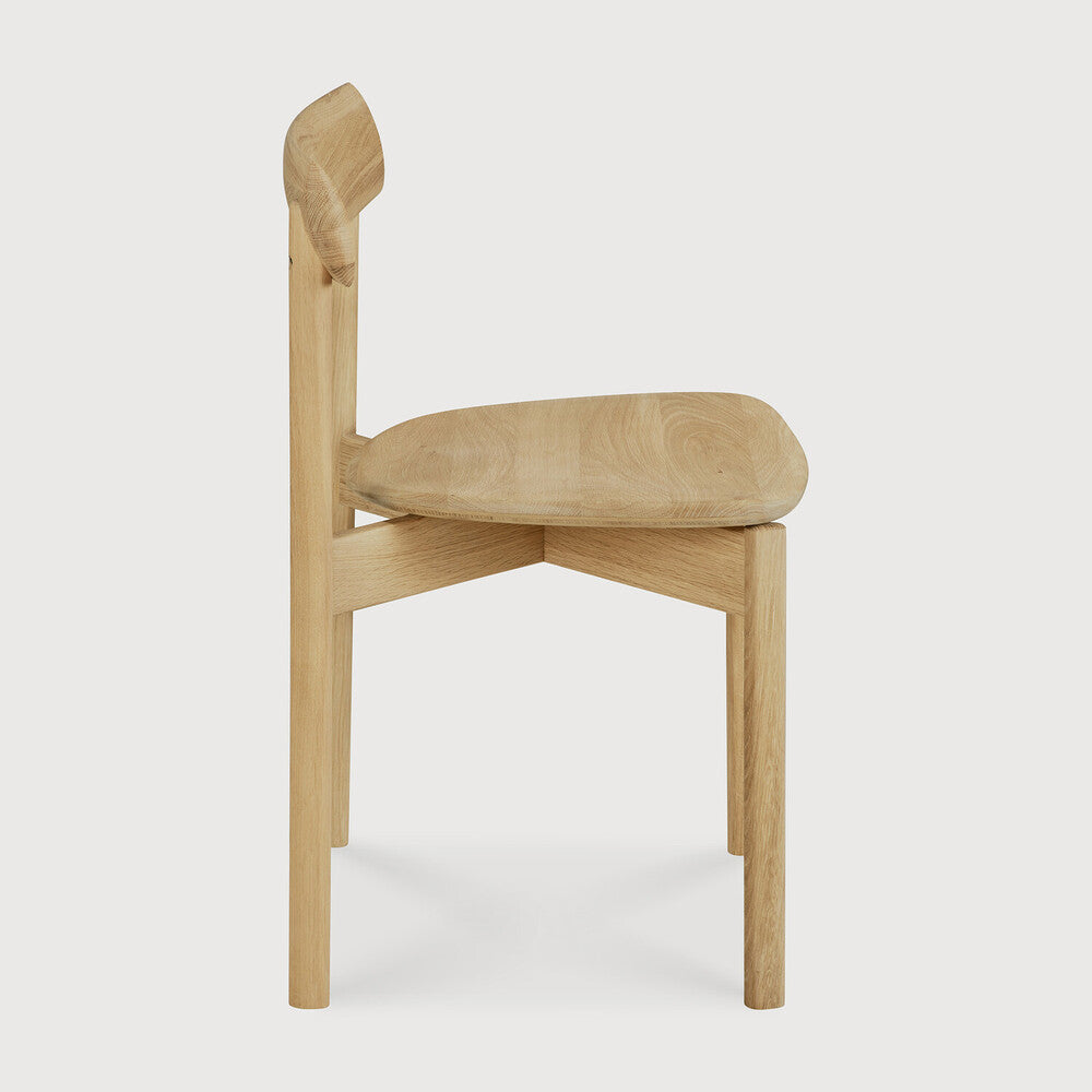 Ethnicraft Risu Dining Chair in oak styled in a dining room