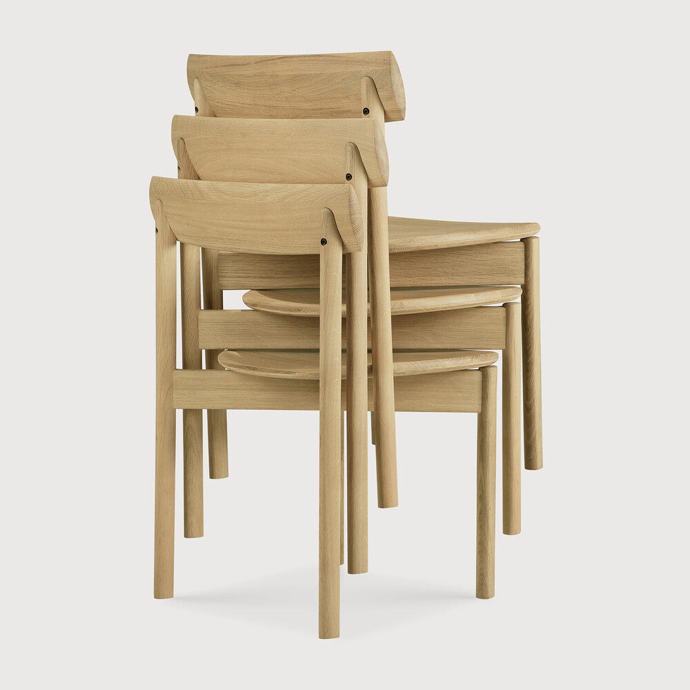 Ethnicraft Risu Dining Chair in oak styled in a dining room