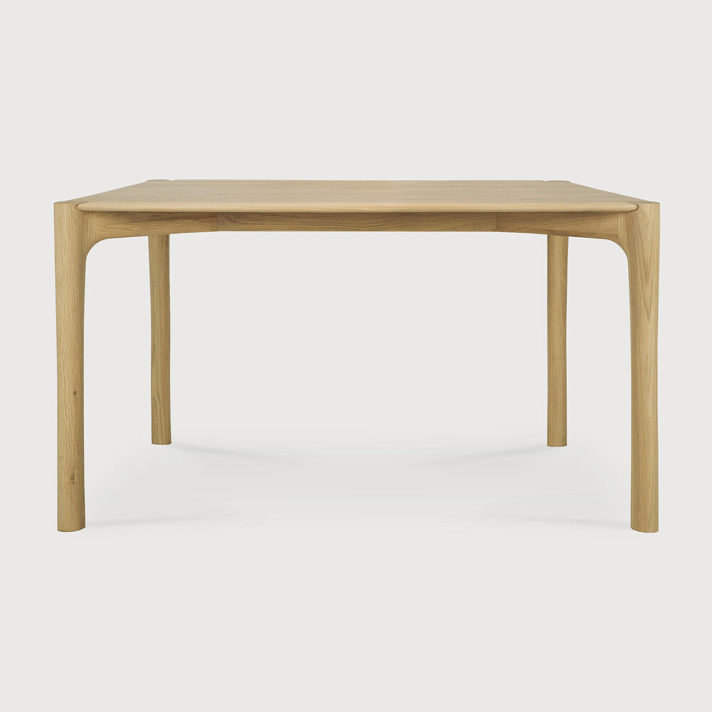 Ethnicraft PI Dining Table in oak styled in a dining room