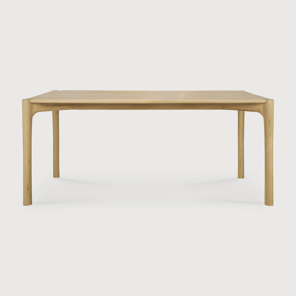 Ethnicraft PI Dining Table in oak styled in a dining room