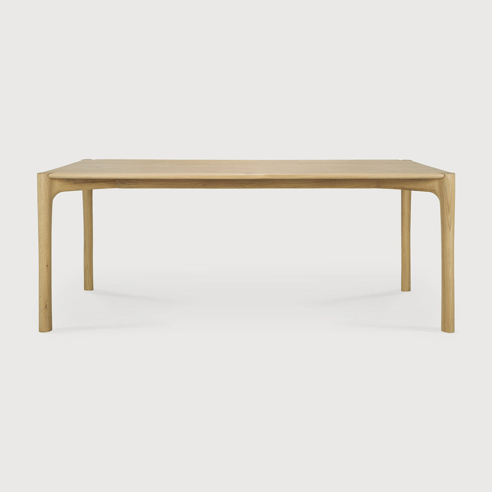 Ethnicraft PI Dining Table in oak styled in a dining room