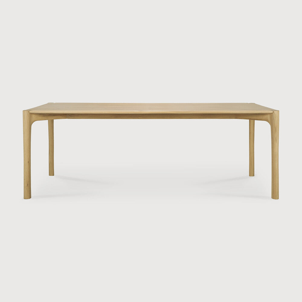 Ethnicraft PI Dining Table in oak styled in a dining room