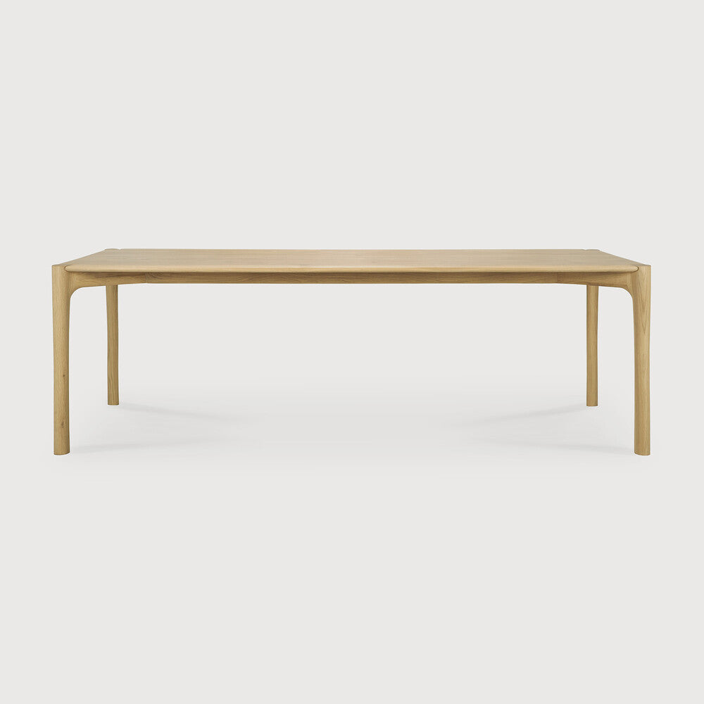 Ethnicraft PI Dining Table in oak styled in a dining room