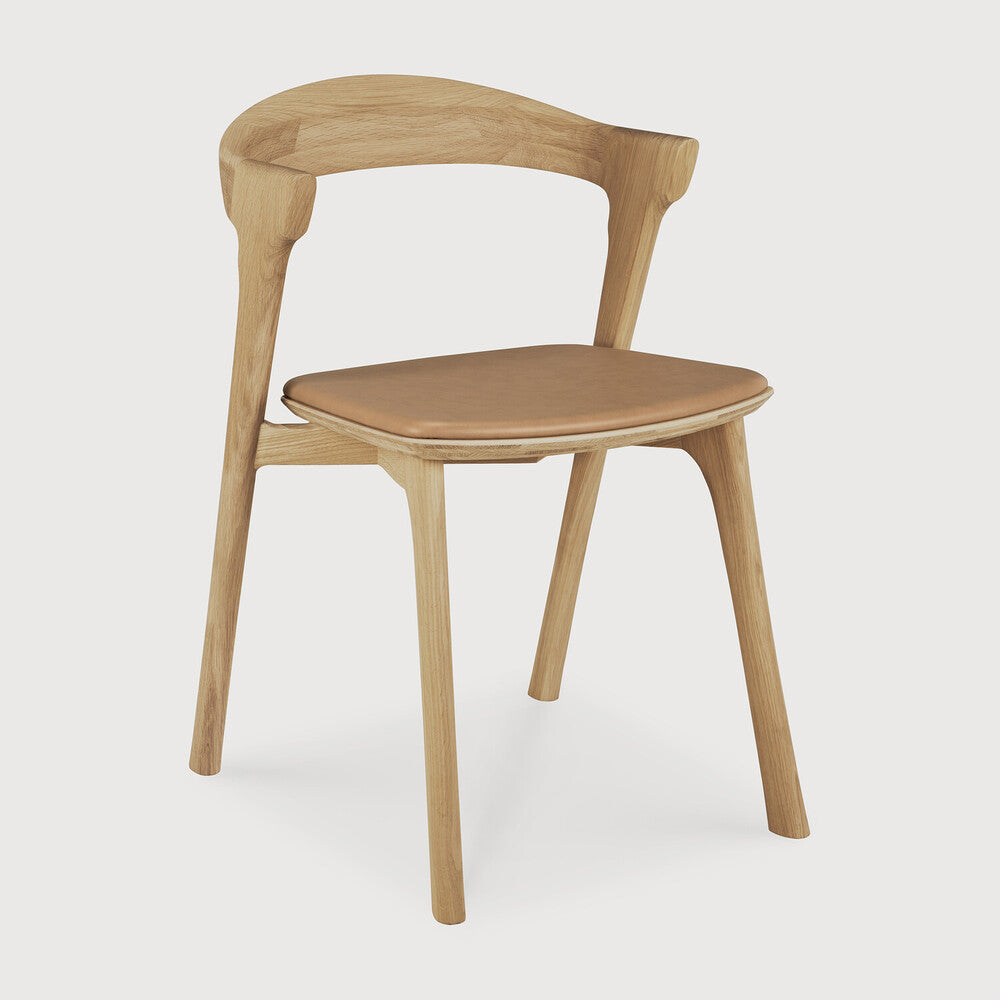 Ethnicraft Bok Dining Chair in oak styled in a dining room