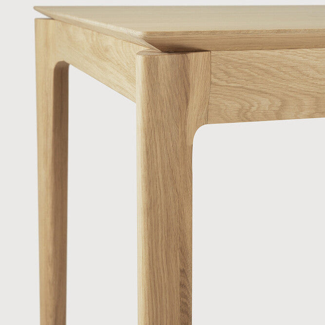 Ethnicraft Bok Extendable Dining Table in oak styled in a dining room