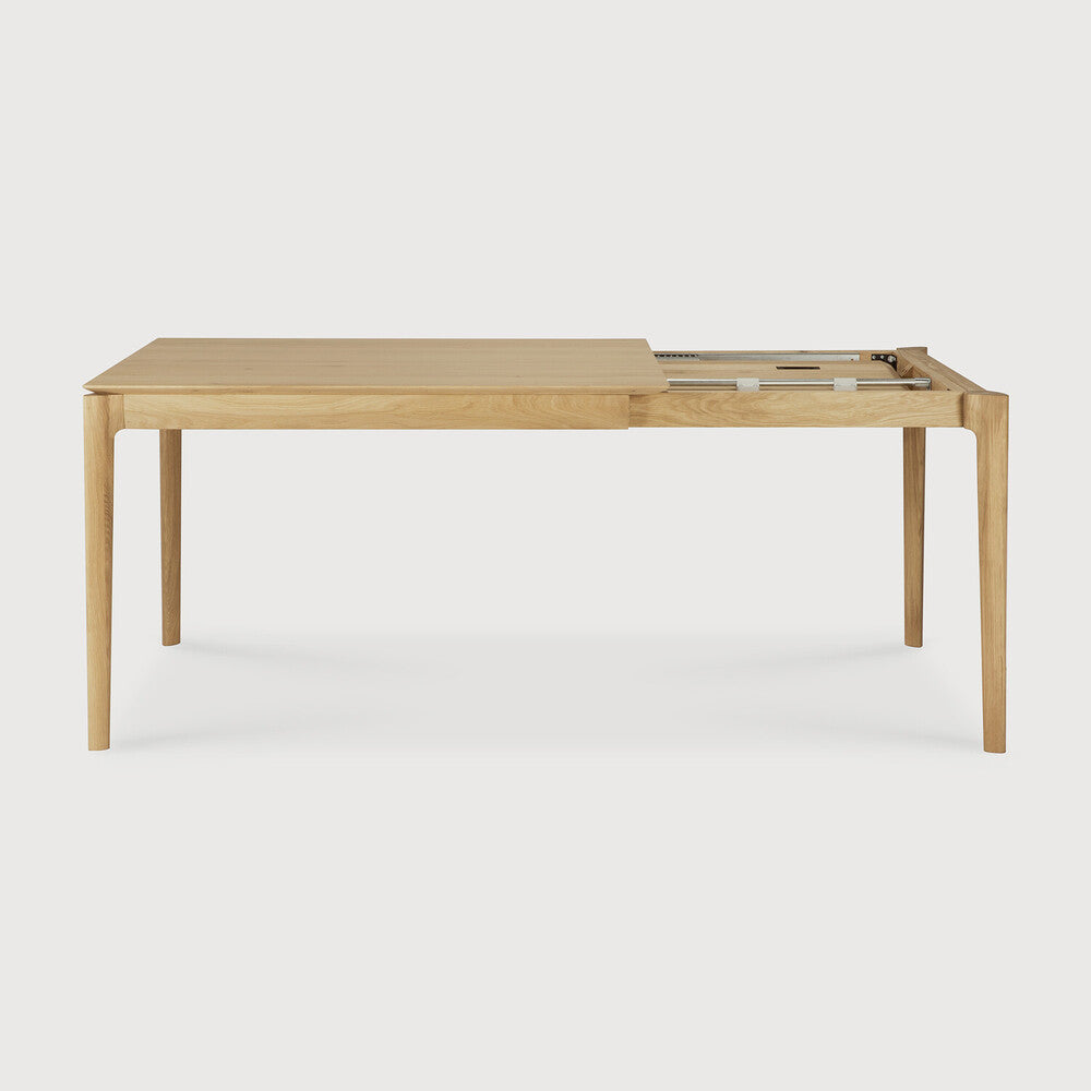Ethnicraft Bok Extendable Dining Table in oak styled in a dining room