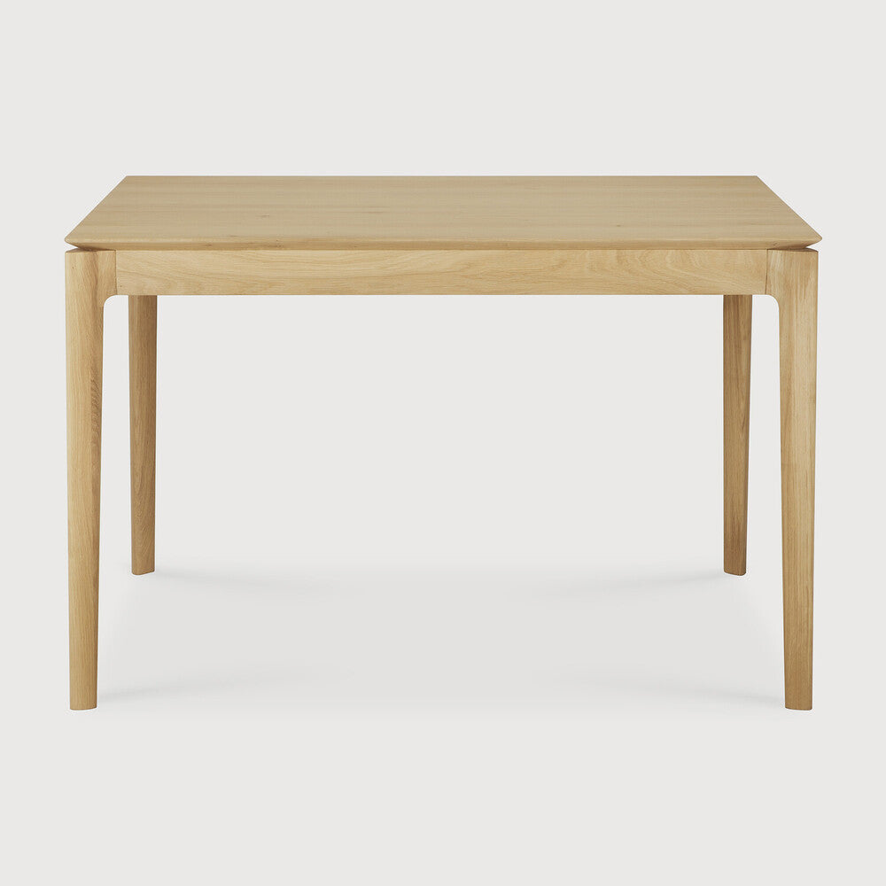 Ethnicraft Bok Extendable Dining Table in oak styled in a dining room
