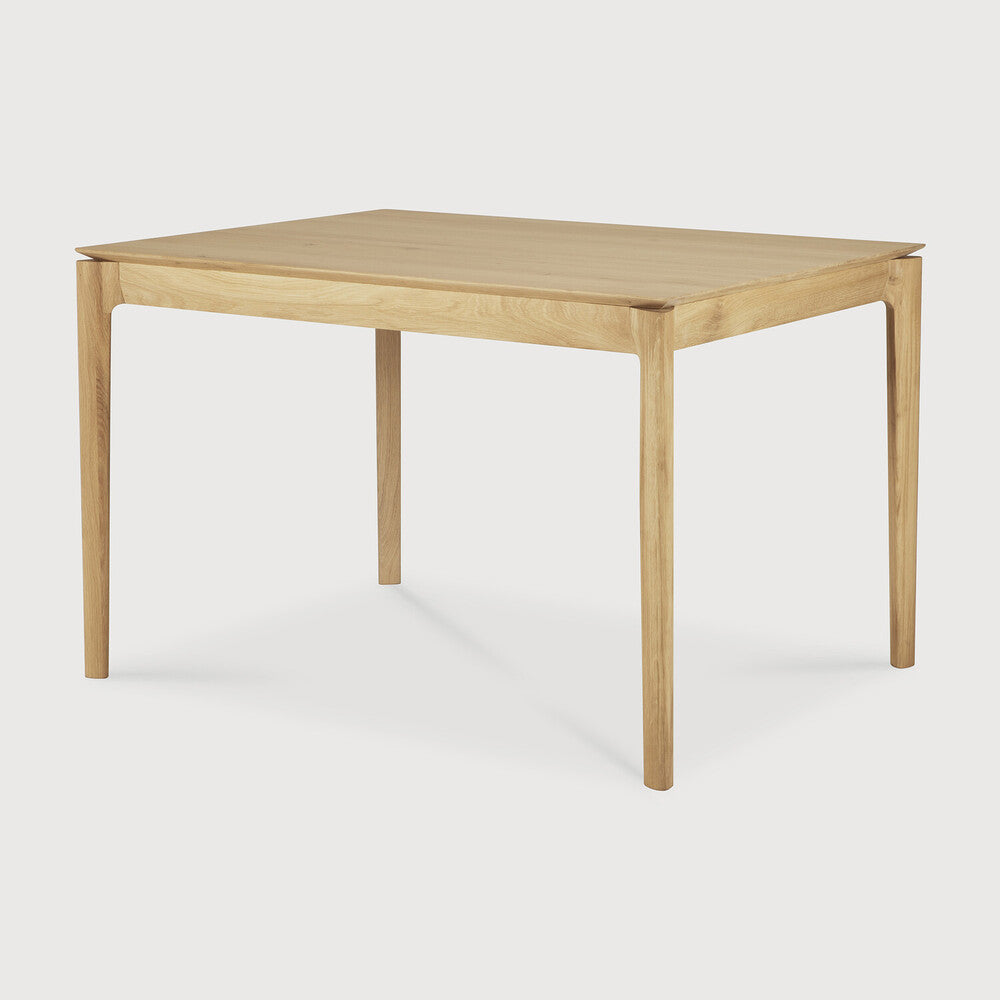 Ethnicraft Bok Extendable Dining Table in oak styled in a dining room