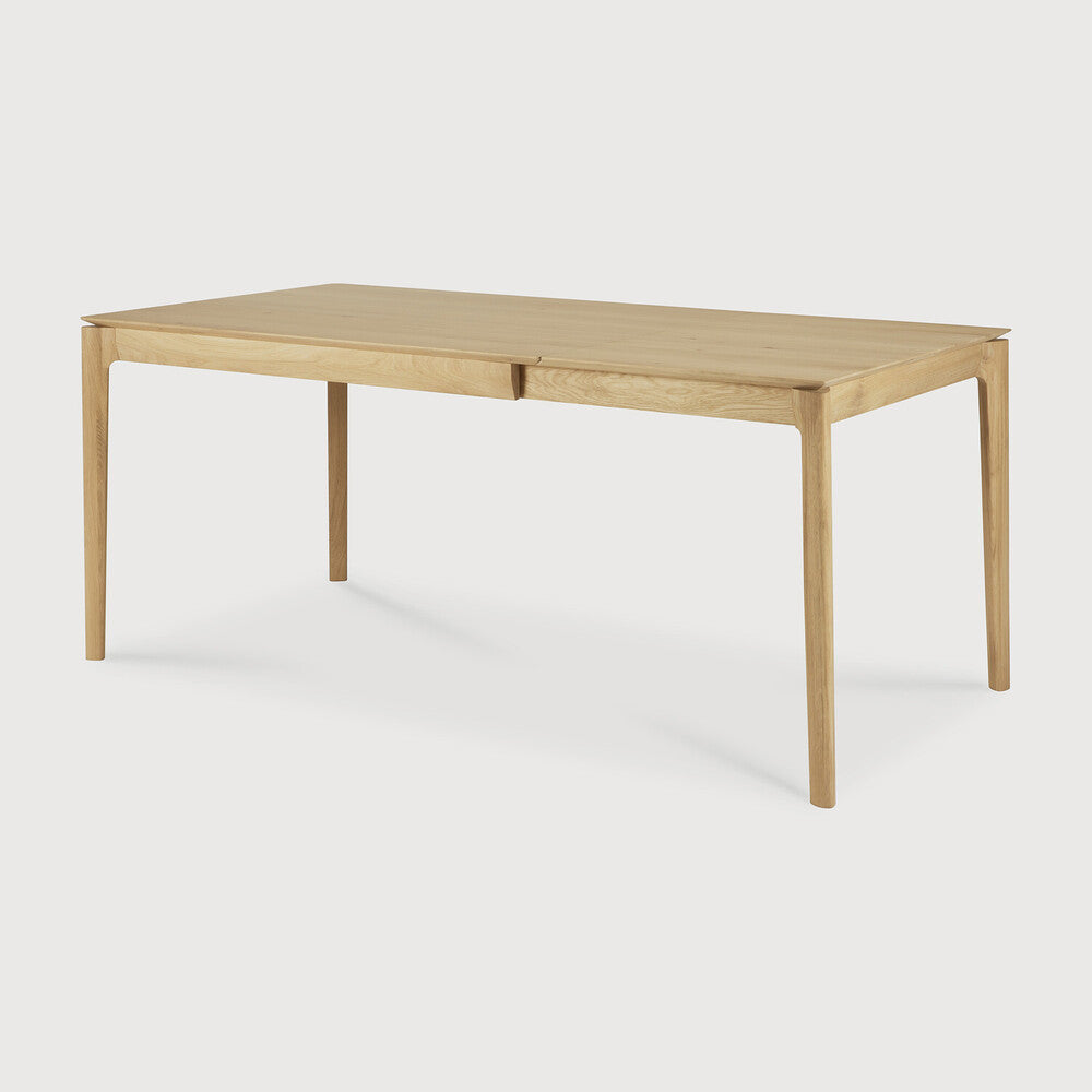 Ethnicraft Bok Extendable Dining Table in oak styled in a dining room