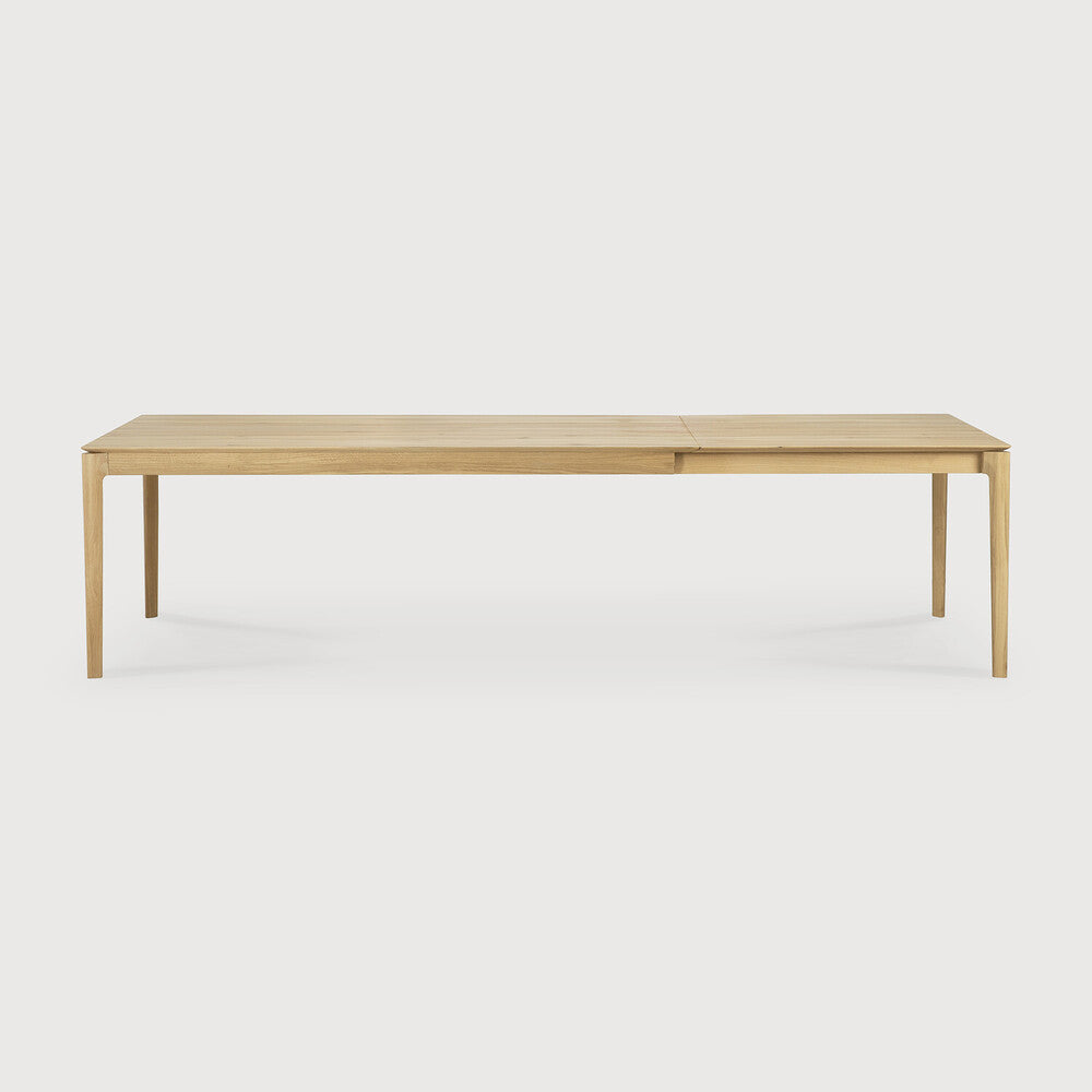 Ethnicraft Bok Extendable Dining Table in oak styled in a dining room