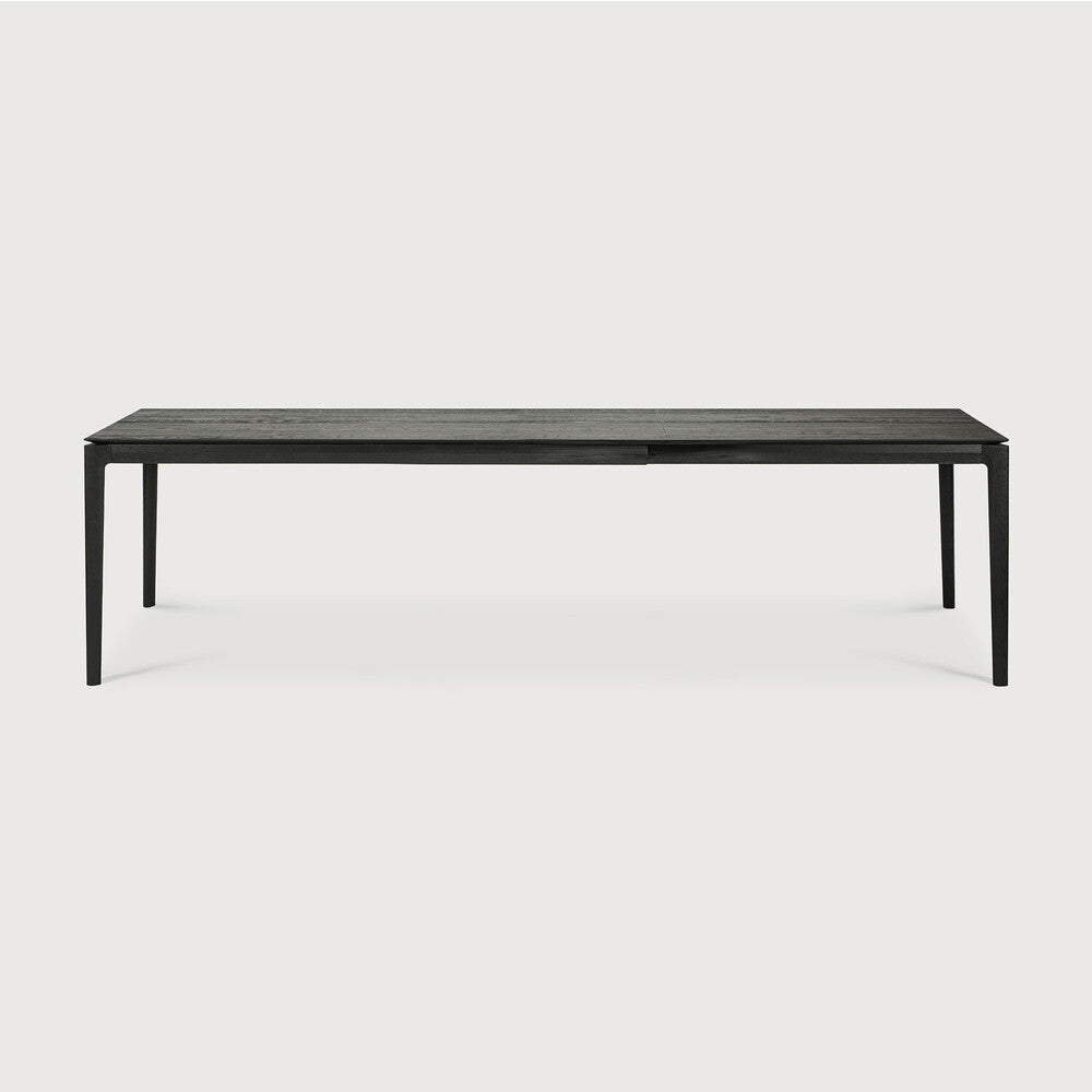 Ethnicraft Bok Extendable Dining Table in oak styled in a dining room