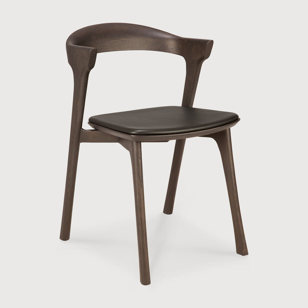 Ethnicraft Bok Dining Chair in oak styled in a dining room